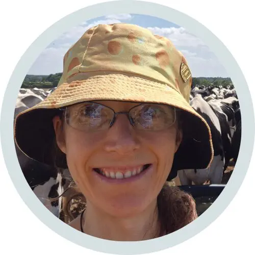 Image of Dr Caroline Wood in a bucket hat, smiling