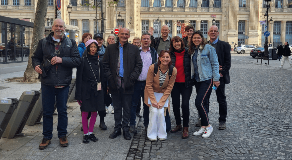 Group of Academy of Cheese members and staff meet outside Paris Gard Du Nord Railway station