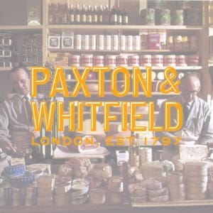 Paxton and Whitfield Thumbnail Image with logo on top of a heritage photo of the original cheese counter